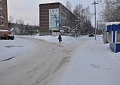 Снег на дороге во дворах